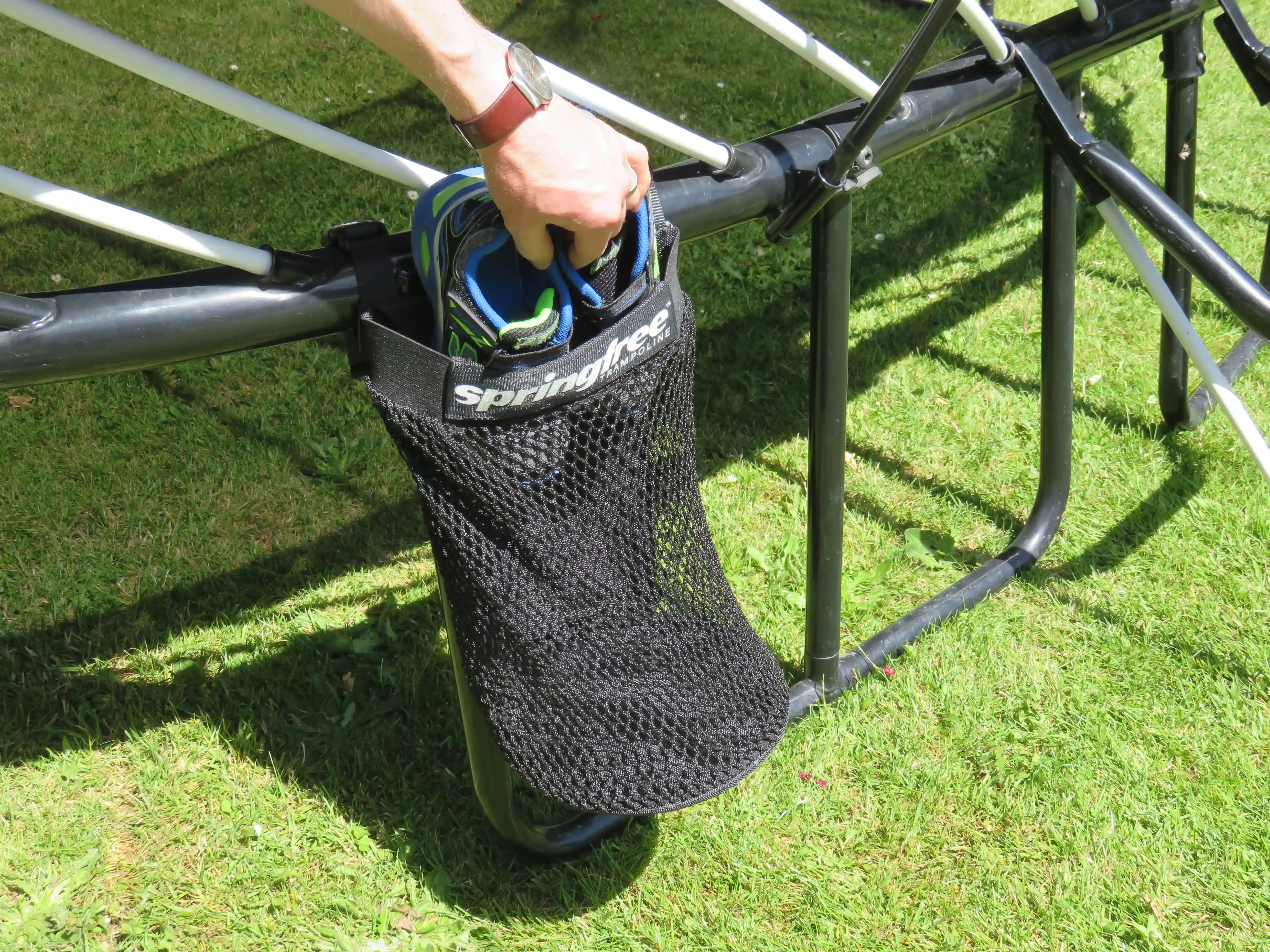 springfree trampoline storage bag storing a shoes