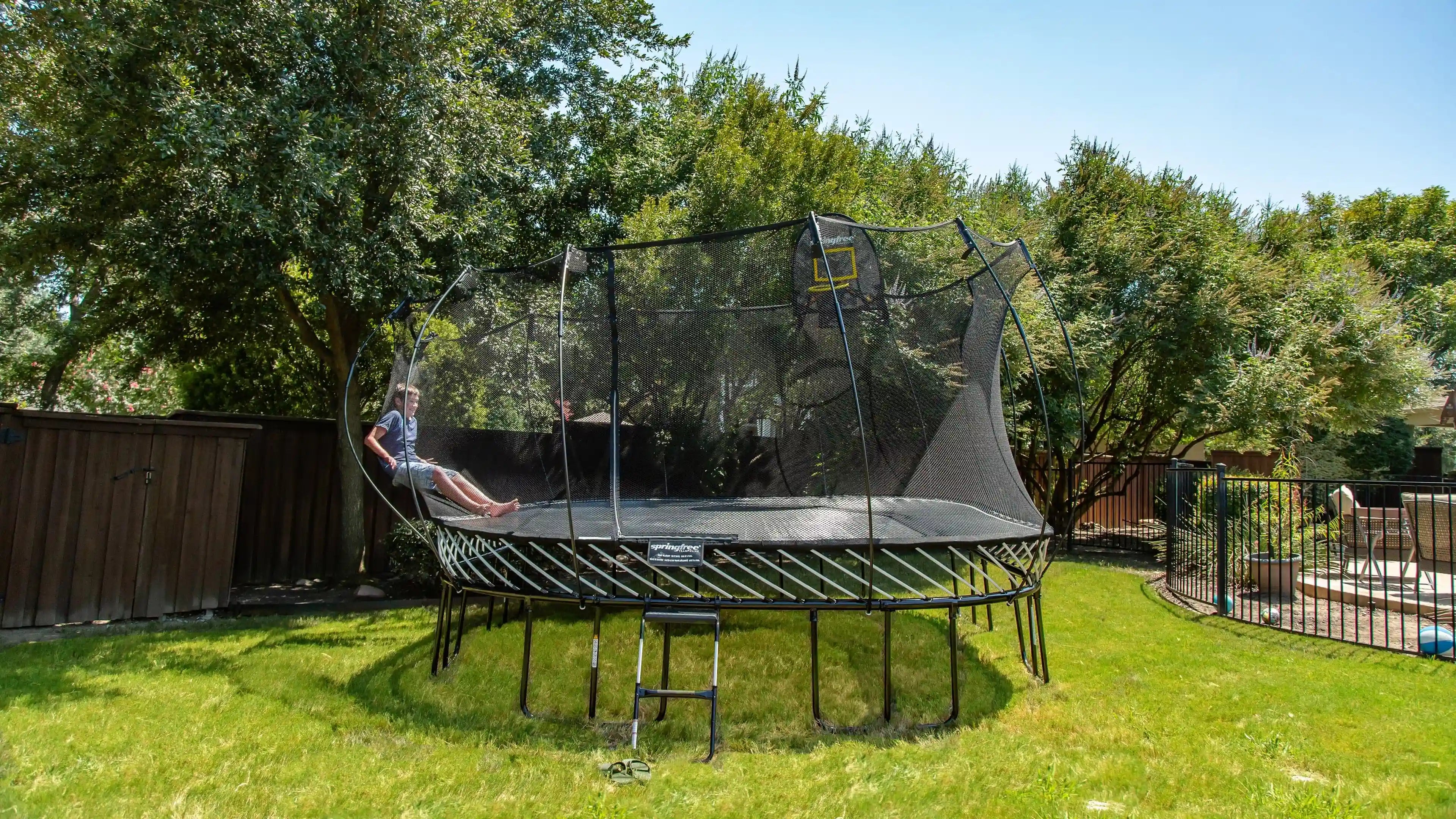 Boy bouncing of flexinet
