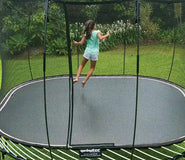Load image into Gallery viewer, Young girl jumping on the trampoline

