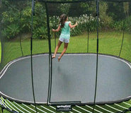 Load image into Gallery viewer, Young girl jumping on the trampoline