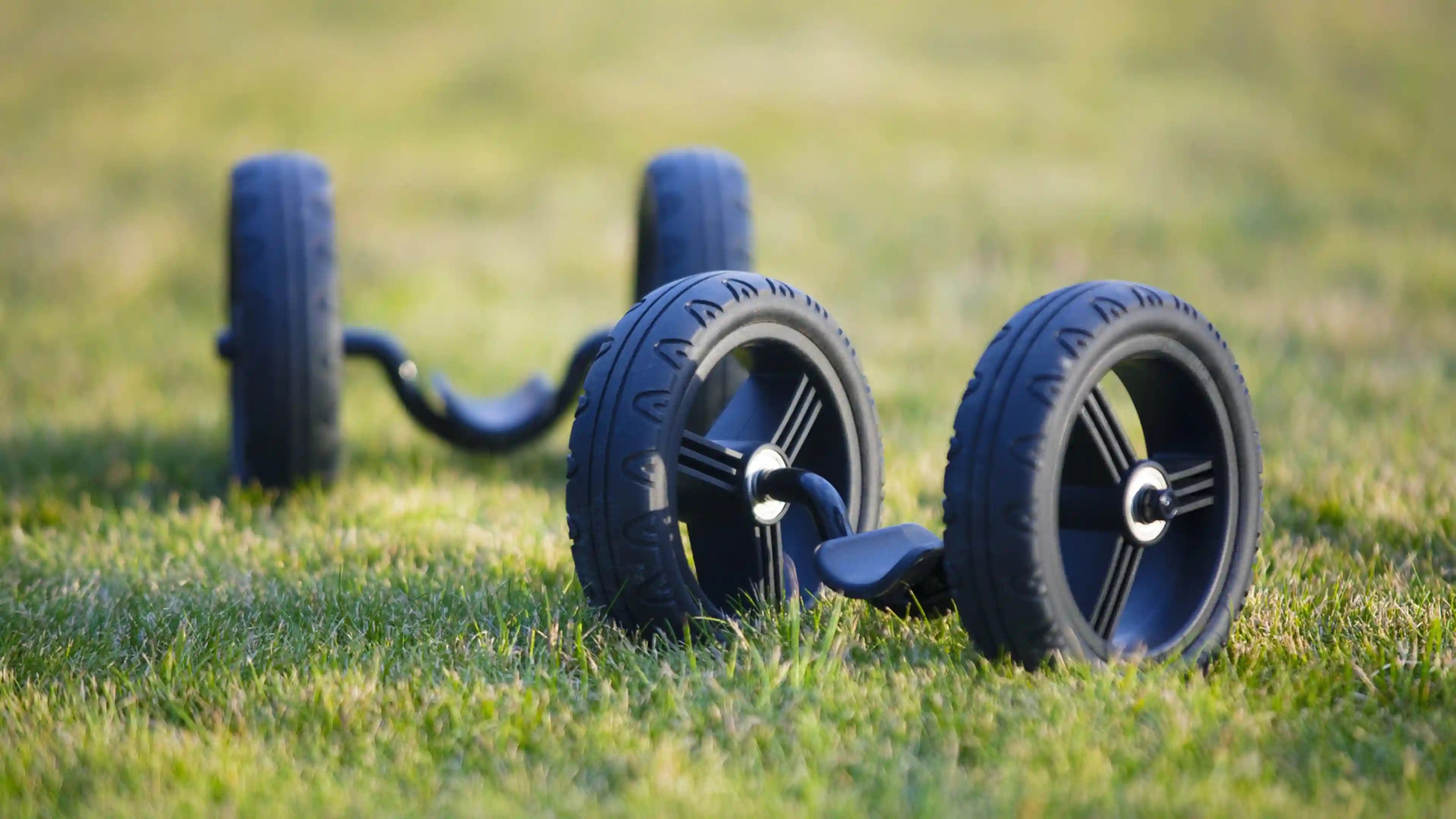 a pair of shifting wheels on the grass